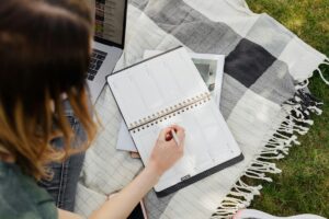 Faculty member planning summer academic productivity goals for writing and research