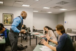 Faculty member facilitating a difficult classroom conversation with students
